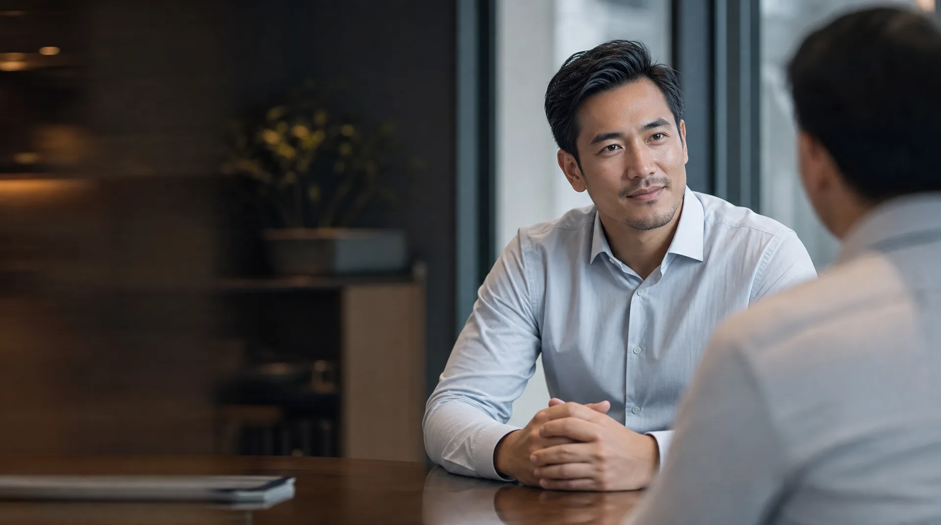 Advisor listening to a client across the table